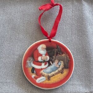Kneeling Santa ornament 1984 Roman Inc. no chips or defects.